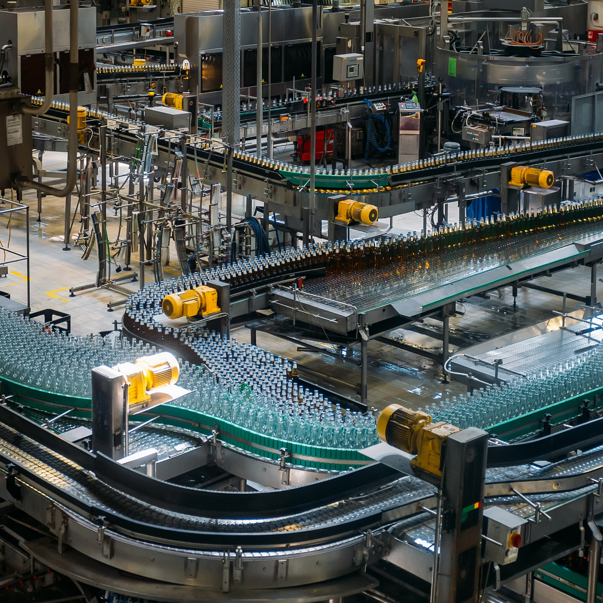 Modern automated beer bottling production line.